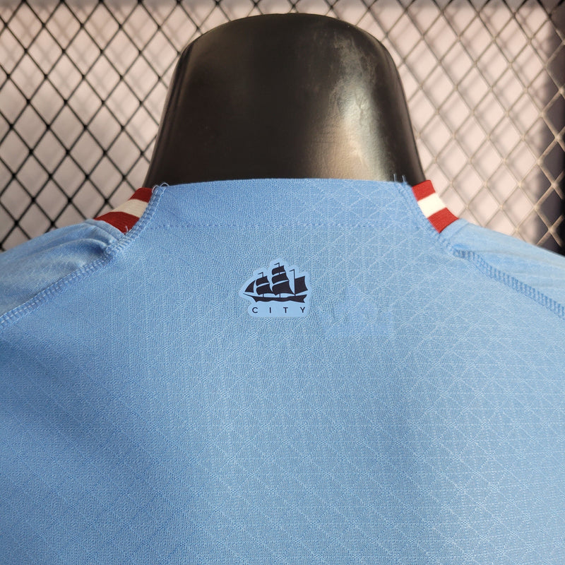 CAMISA VERSÃO PLAYER DO MANCHESTER CITY 22/23 AZUL