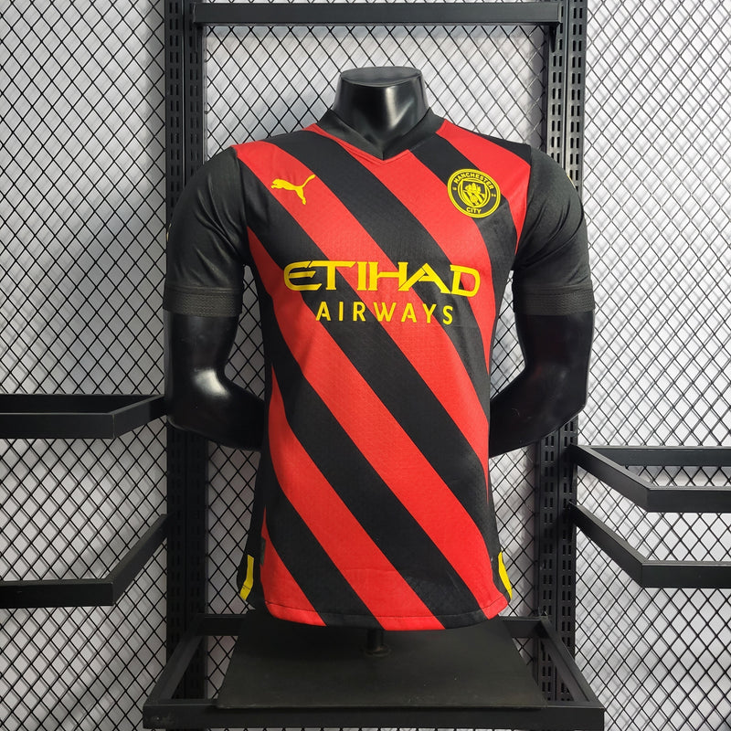 CAMISA VERSÃO PLAYER DO MANCHESTER CITY 22/23 VERMELHO E PRETO