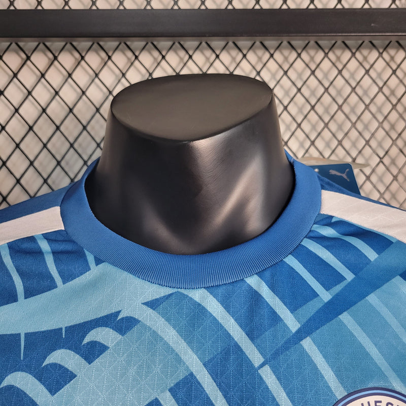 CAMISA VERSÃO PLAYER DO MANCHESTER CITY 23/24 AZUL TREINO