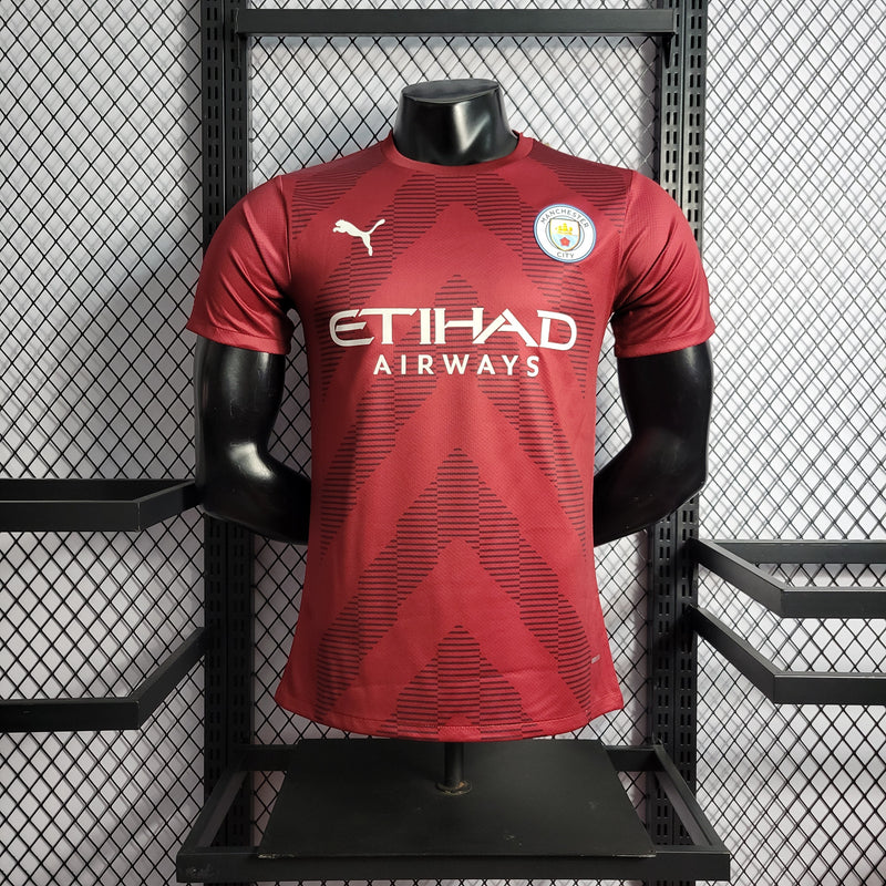 CAMISA VERSÃO PLAYER DO MANCHESTER CITY 23/24 RED GOLEIRO