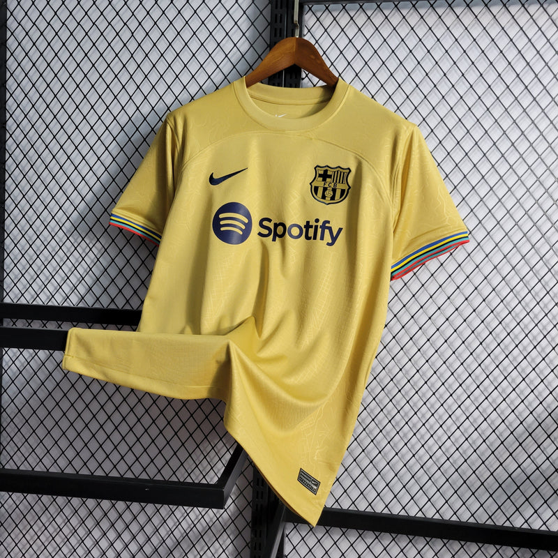 CAMISA DO BARCELONA 22/23 DOURADO