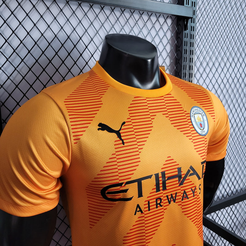 CAMISA VERSÃO PLAYER DO MANCHESTER CITY 23/24 LARANJA GOLEIRO