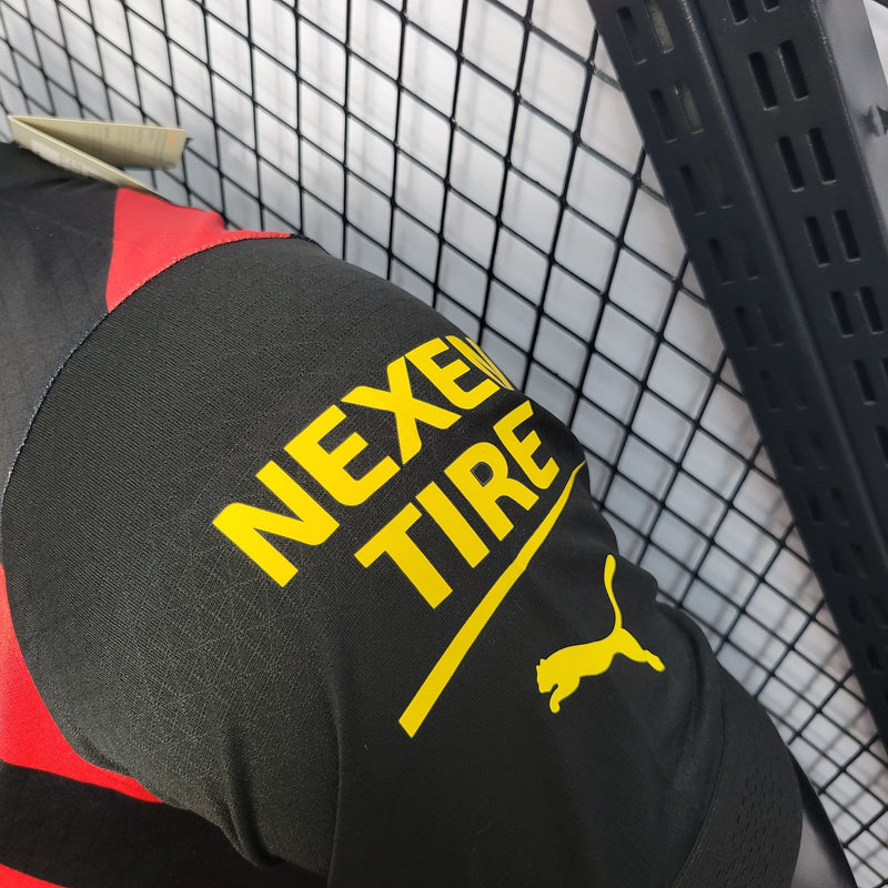 CAMISA VERSÃO PLAYER DO MANCHESTER CITY 22/23 VERMELHO E PRETO