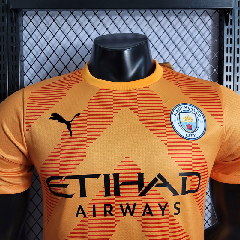 CAMISA VERSÃO PLAYER DO MANCHESTER CITY 23/24 LARANJA GOLEIRO